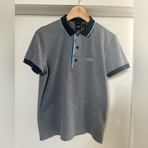 Hugo Boss slim-fitting polo/ cotton /chest logo.
Short sleeve, standard length